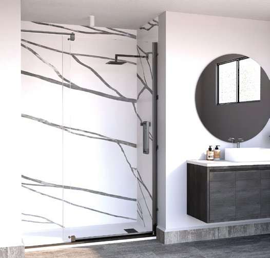 Shower with dramatic veined marble-look surround